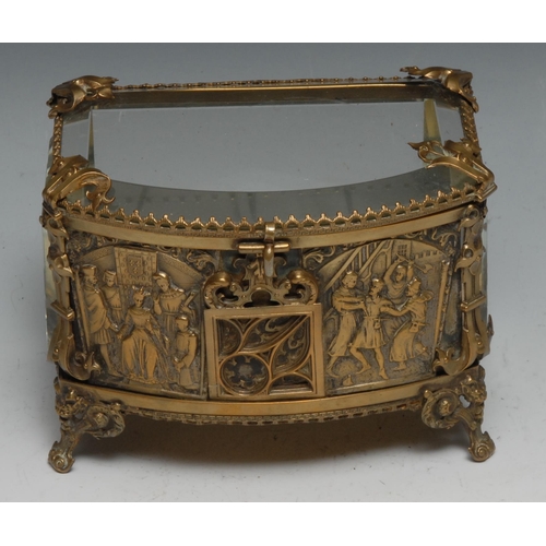 1267 - A French gilt metal bijouterie display casket, bevelled glazed panels, the front in the Gothic taste... 