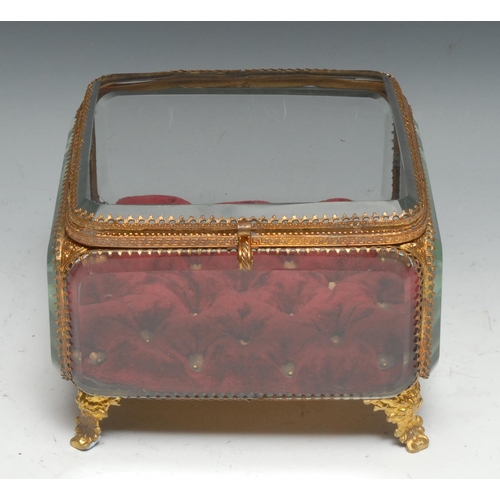 1273 - A French gilt metal rounded square bijouterie display casket, bevelled panels, leafy cartouche shape... 