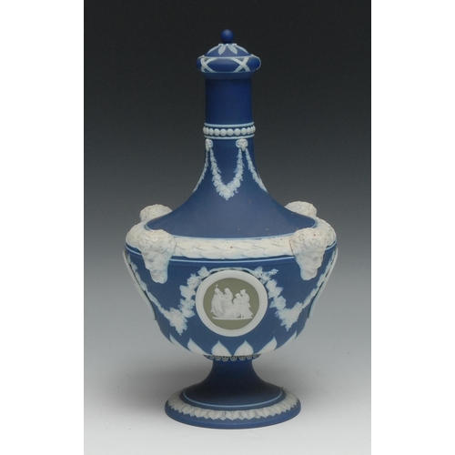 547 - A 19th century Wedgwood Jasperware urnular vase and cover, sprigged with swags and rams masks on dar... 