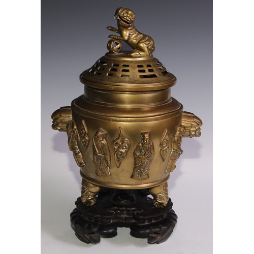 906 - A Chinese bronze censer and cover, temple lion finial, the side cast and applied with allegorical fi... 
