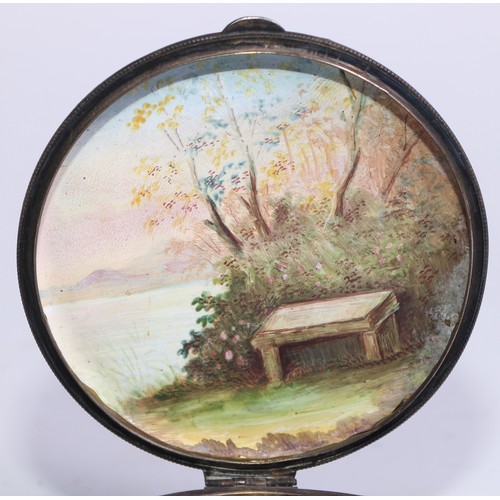 1284 - An Austrian enamel circular table snuff box, painted with a courting couple in a pastoral idyllic la... 