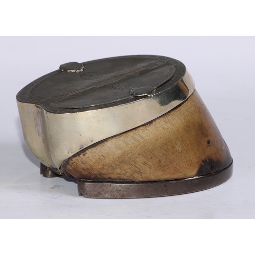 1293 - A Victorian E.P.N.S mounted horse hoof twin-compartment table snuff box, the hinged covers outlined ... 