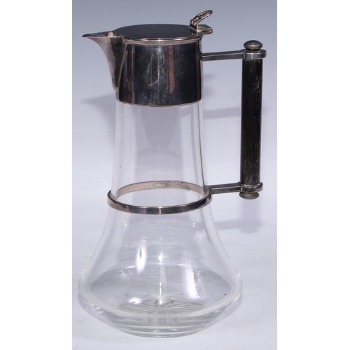 20 - Design Post-1860 - a Victorian E.P.N.S mounted claret jug, in the manner of Dr Christopher Dresser, ... 