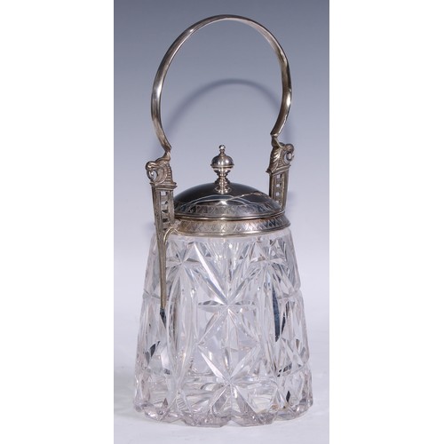 25 - A Secessionist E.P.N.S mounted cut glass biscuit box, arched handle springing from griffin crested b... 