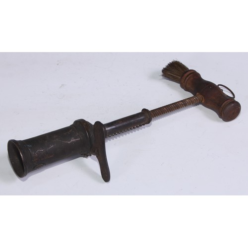 1295 - A 19th century patent rack and pinion corkscrew, the brass barrel with steel butterfly key, turned b... 