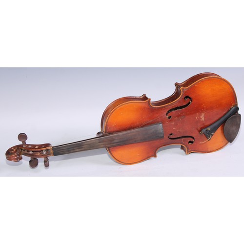 1311 - A violin, the two piece back 35.75cm long excluding button, paper label printed Dulcis et Fortis, ro... 