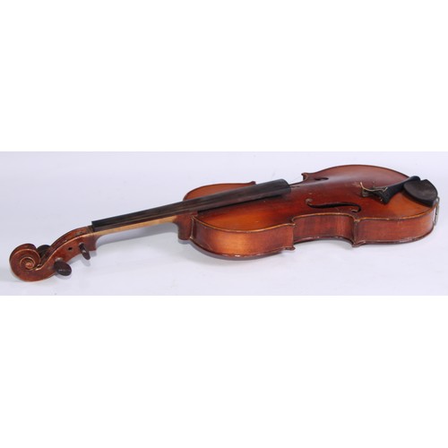 1311 - A violin, the two piece back 35.75cm long excluding button, paper label printed Dulcis et Fortis, ro... 