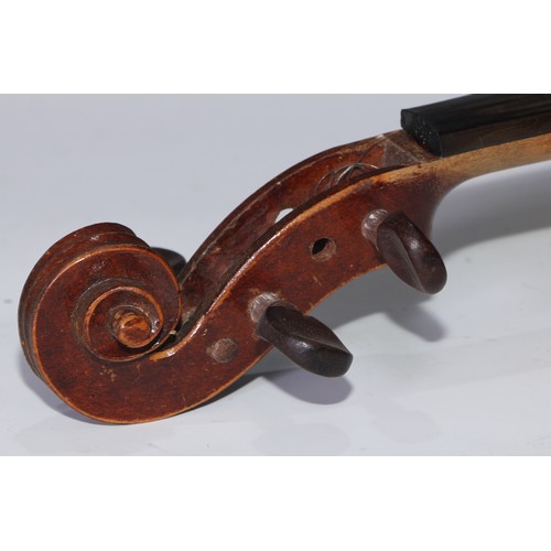 1311 - A violin, the two piece back 35.75cm long excluding button, paper label printed Dulcis et Fortis, ro... 