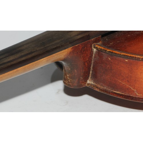 1311 - A violin, the two piece back 35.75cm long excluding button, paper label printed Dulcis et Fortis, ro... 