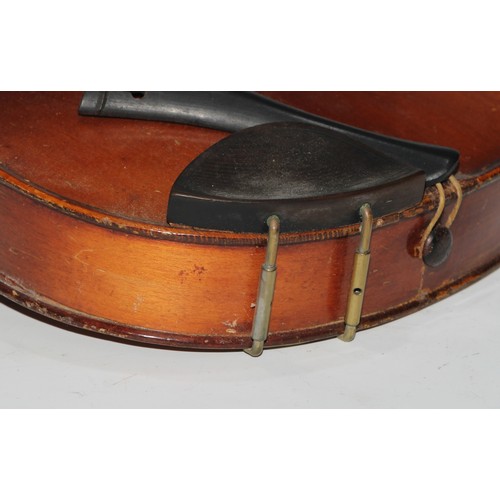 1311 - A violin, the two piece back 35.75cm long excluding button, paper label printed Dulcis et Fortis, ro... 