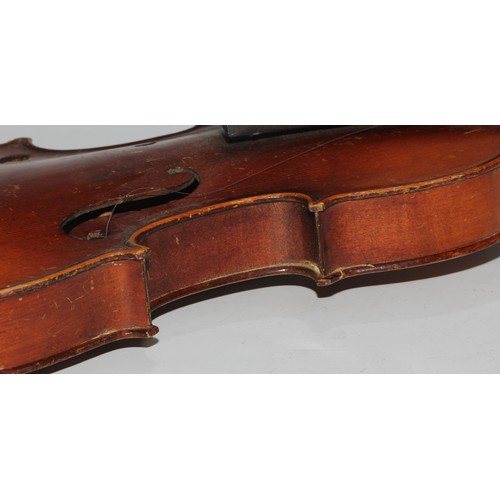 1311 - A violin, the two piece back 35.75cm long excluding button, paper label printed Dulcis et Fortis, ro... 