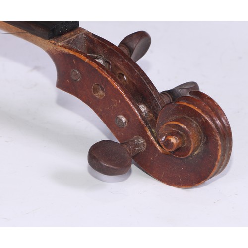 1311 - A violin, the two piece back 35.75cm long excluding button, paper label printed Dulcis et Fortis, ro... 