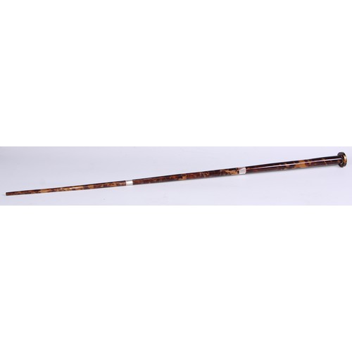 1344 - An early 20th century tortoiseshell walking cane, the circular pommel inlaid in mother of pearl with... 