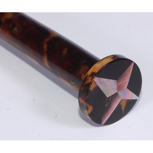 1344 - An early 20th century tortoiseshell walking cane, the circular pommel inlaid in mother of pearl with... 