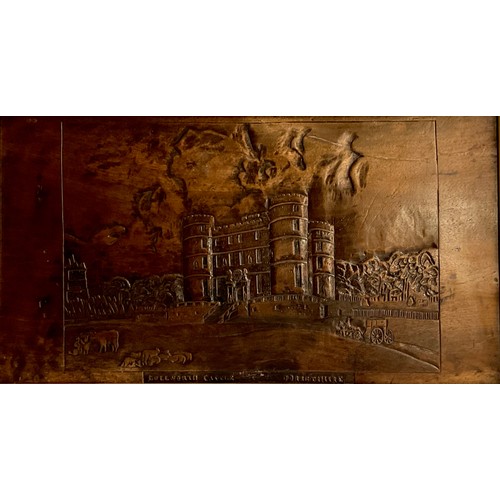 1393 - A 19th century folk art carved panel, in shallow relief with a named view of Lullworth Castle, Dorse... 