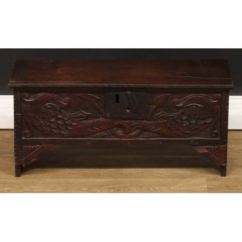 1834 - A small ‘18th century’ oak six plank chest, of child’s coffer proportions, hinged top, the front car... 