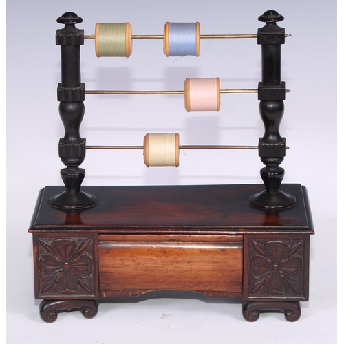 1620 - A 19th century mahogany cotton reel stand, the turned superstructure with three horizontal bob in sp... 