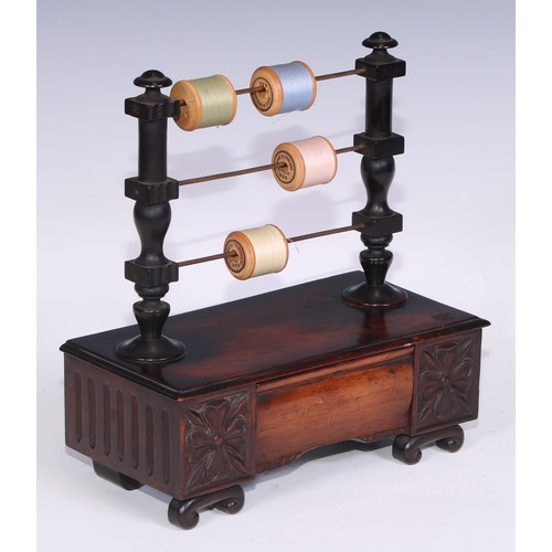 1620 - A 19th century mahogany cotton reel stand, the turned superstructure with three horizontal bob in sp... 