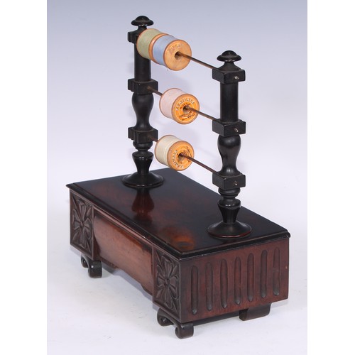 1620 - A 19th century mahogany cotton reel stand, the turned superstructure with three horizontal bob in sp... 