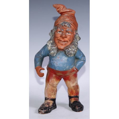 1397 - A 19th century German terracotta gnome, painted in polychrome, 32cm high, c.1880