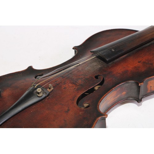 1370 - A violin, the two piece back 35cm long excluding button, 58cm long overall, 19th century