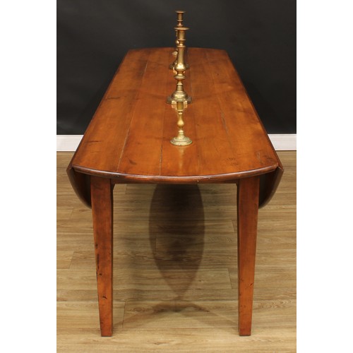 1613 - A George III style cherry wake table, oval top with fall leaves, tapered square legs, 77cm high, 228... 