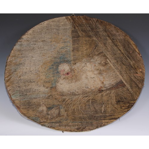 1356 - An early 19th century oval woolwork picture, worked as a nesting fowl and chicks, 54cm x 65cm