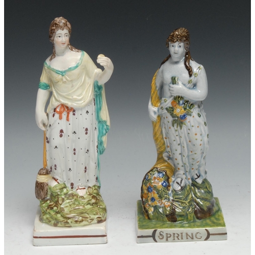 528 - A Staffordshire figure, Allegorical of Spring, she stands in flowing robes, by a cornucopia, square ... 