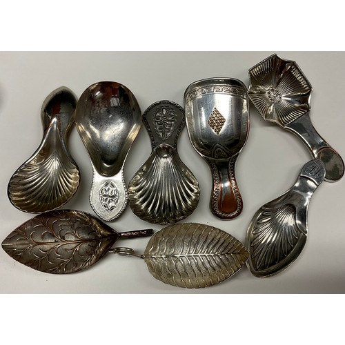 44 - A pair of George III Old Sheffield Plate caddy spoons, shell bowls, 8cm long, c.1785; others, variou... 