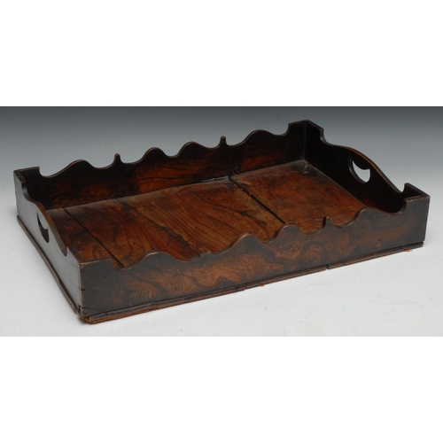 1624 - A 19th century oak two handled gallery tray, pierced hand holes, wavy rim, 53cm long, 36cm wide, c.1... 