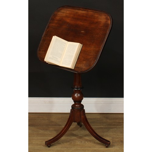 1762 - A Regency mahogany combination reading and occasional table, rounded rectangular top, turned column,... 