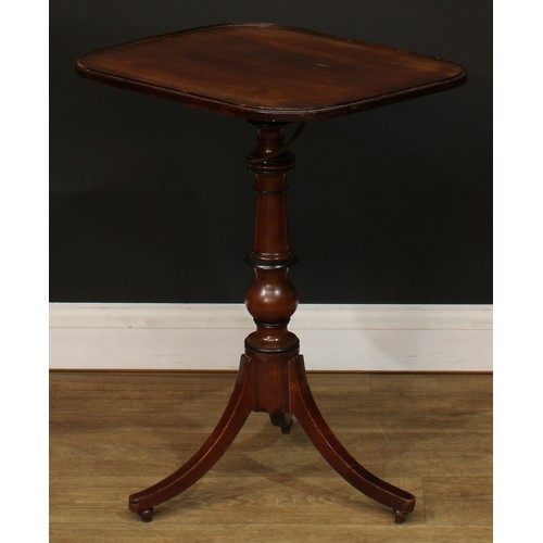 1762 - A Regency mahogany combination reading and occasional table, rounded rectangular top, turned column,... 