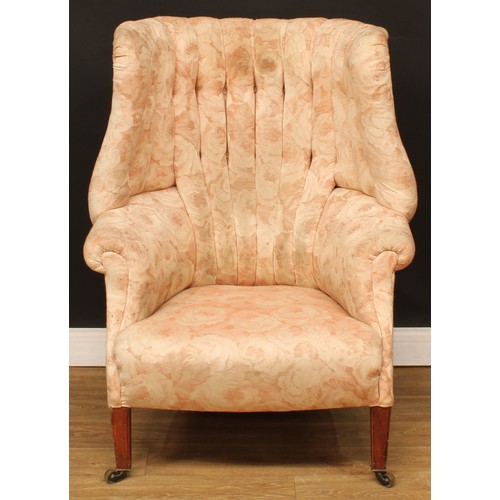 1612 - A George III Revival wingback armchair, stuffed-over upholstery, tapered square forelegs, brass cast... 