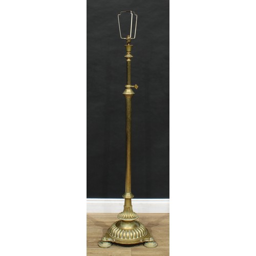 1654 - A late 19th century brass telescopic standard lamp, lotus sconce, fluted pillar, domed base, 125.5cm... 