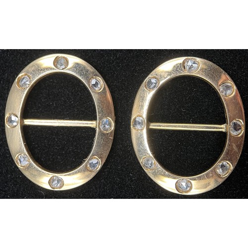 441 - A pair of Victorian oval diamond and gold coloured metal buckles, quite plain, set with eight evenly... 