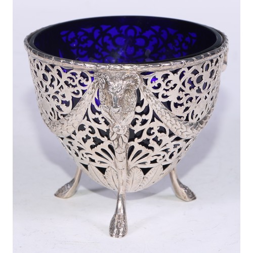 156 - A George V Adam Revival silver sweetmeat bowl, pierced with scrolling foliage and cast with ram mono... 