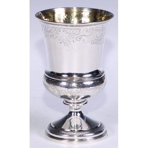 136 - A George III silver campana pedestal goblet, engraved in the Rococo taste with bands of trellis and ... 