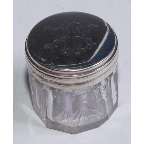 97 - A collection of Victorian silver mounted dressing jars and boxes, various dates and makers (7)