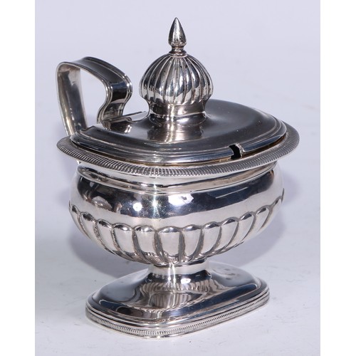 80 - A 19th century Dutch silver half-fluted boat shaped pedestal condiment set, comprising a mustard and... 