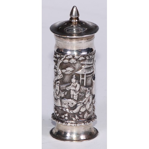 90 - A Chinese silver cylindrical pepper, chased with figures amongst pagodas and blossoming prunus, 8cm ... 