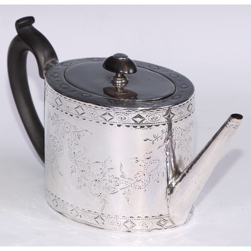 147 - A George III silver oval drum teapot, bright-cut engraved with swags of flowers, lozenges, paterae a... 