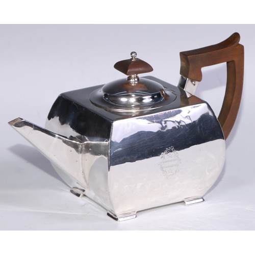 134 - A George III silver bowed square teapot, hinged domed cover, bracket feet, fruitwood fittings, 25cm ... 