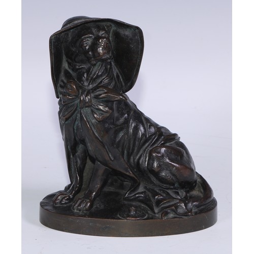 1385 - A 19th century brown patinated bronze novelty inkwell, amusingly cast as a dog wearing a bonnet and ... 