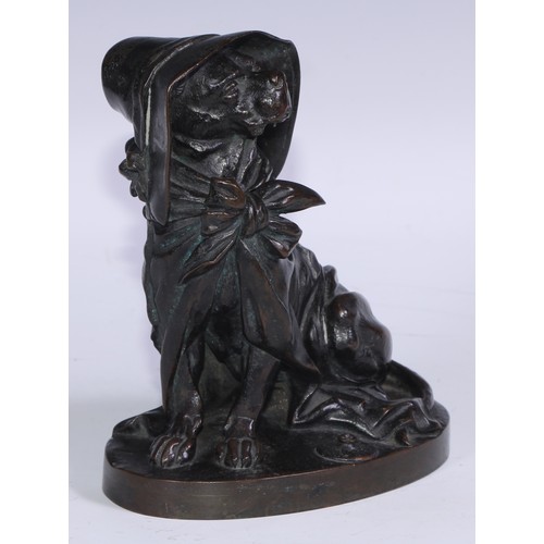 1385 - A 19th century brown patinated bronze novelty inkwell, amusingly cast as a dog wearing a bonnet and ... 