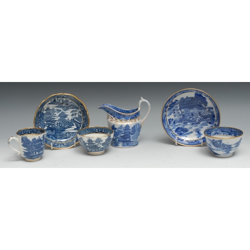 685 - A Caughley Willow pattern tea bowl coffee cup and saucer, printed in underglazed blue, gilt line bor... 