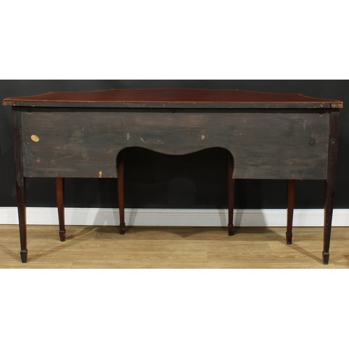 1831 - A Sheraton Revival satinwood crossbanded mahogany serpentine serving table or sideboard, slightly ov... 