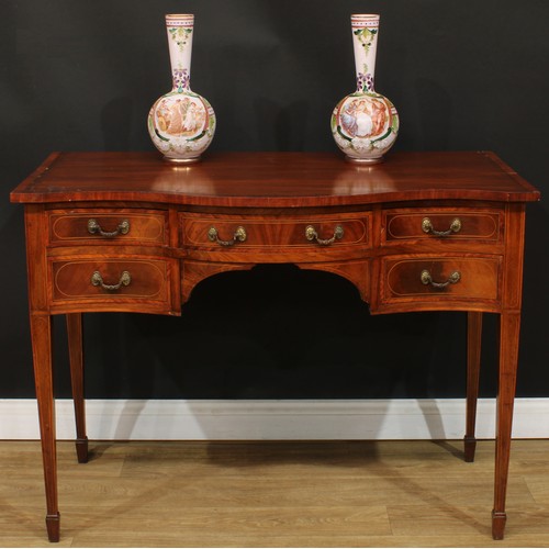 1832 - A Sheraton Revival satinwood crossbanded mahogany serpentine serving table, slightly oversailing top... 