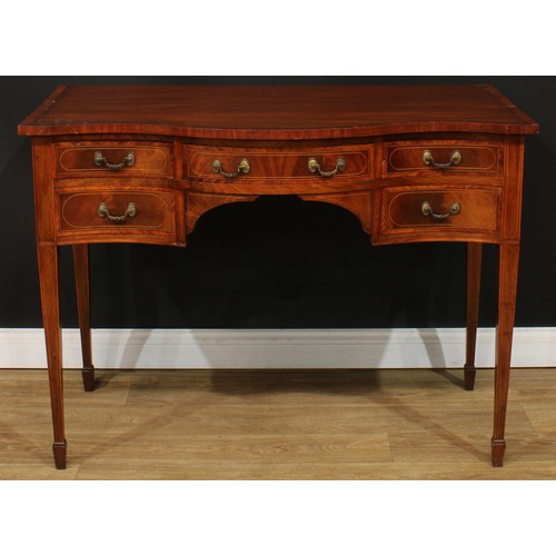 1832 - A Sheraton Revival satinwood crossbanded mahogany serpentine serving table, slightly oversailing top... 