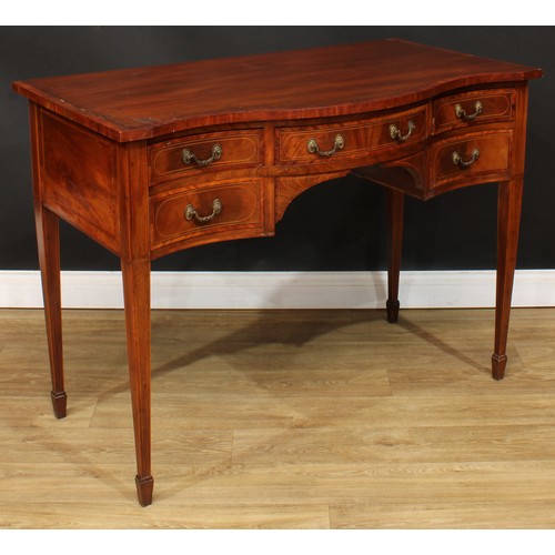 1832 - A Sheraton Revival satinwood crossbanded mahogany serpentine serving table, slightly oversailing top... 