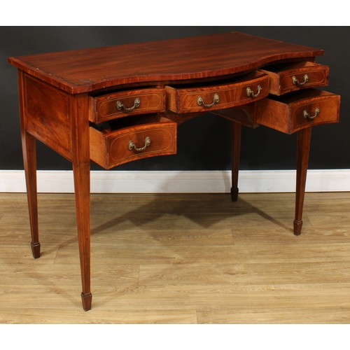 1832 - A Sheraton Revival satinwood crossbanded mahogany serpentine serving table, slightly oversailing top... 